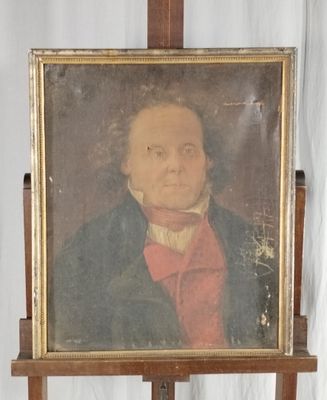 portrait d'un homme vêtu d'une chemise rouge et d'une veste noire