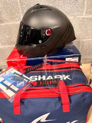a helmet and a bag sitting on a table