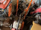a small engine and a small engine on the floor