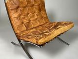 an image of a chair made out of wood with a metal frame