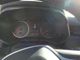 a close up of a car dashboard with a speedometer and gauges