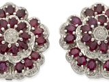 une paire de boucles d'oreilles en rubis et diamants