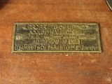 a plaque on the back of an old sewing machine