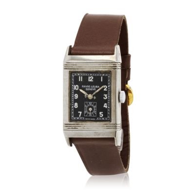 a close up of a wrist watch with a brown leather band