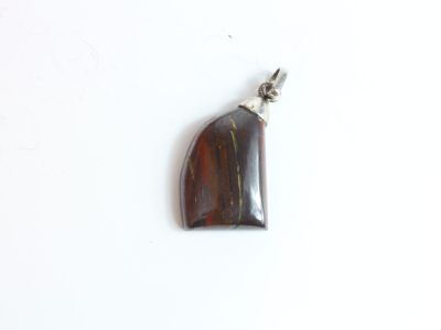 brown tiger eye stone pendant with a silver bail on a white background
