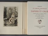 an open book with a drawing of a woman and a child