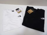 the north face white and black t - shirts are next to each other