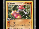 the pokemon card is in a clear plastic holder