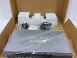 a box that has a laptop in it and some other items in it