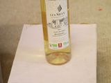 a bottle of wine sitting on top of a box