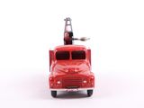 a red toy truck with a ladder on top of it