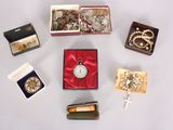 a lot of different items in a box on the table