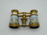 an image of a pair of binoculars sitting on top of a table