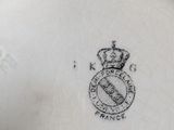 an image of a close up of a plate with a crown on it