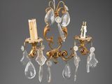 an image of a chandelier with a candle and a candle holder