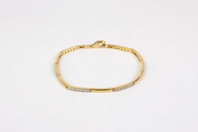 a gold bracelet with diamonds on a white background