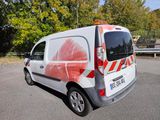 a van that is parked on the side of the road