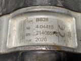 a close up of a metal plate with a number on it