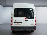 a white van that is parked inside of a building