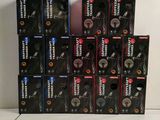 many boxes of different kinds of headphones on the table