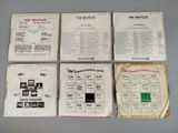 four beatles records, including the beatles ' s album, are on display