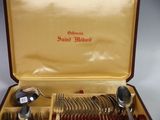 a case with silverware inside of it on a table