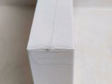 a close up of a piece of paper on a table