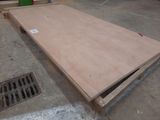 a wooden table that is sitting on the floor