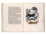 un livre ouvert avec l'image d'un chat dessus