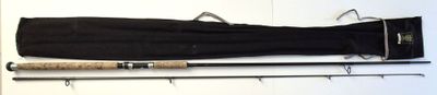 two fishing rods and a fishing rod on a table