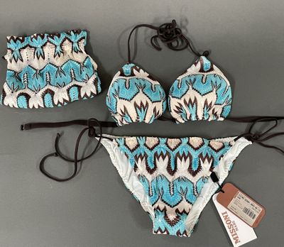 two pieces of swimsuit with a blue and white pattern on it