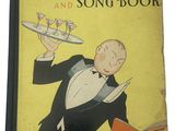 Le guide et le recueil de chansons du barman amateur, avec la photo d'un homme en smoking tenant un plateau