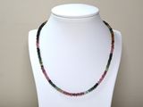 a picture of a necklace made of multi colored beads