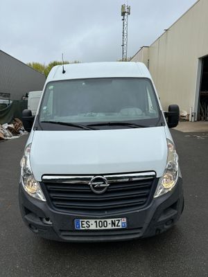 a picture of a white van parked in a parking lot