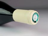 a close up of a bottle of wine with a starbucks logo on it