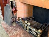 a fireplace with a fire place and a firewood rack