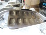 a tray of chocolates sitting on a table next to a bowl