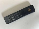 a remote control that is sitting on a table