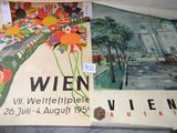 a picture of a bunch of posters on a bed