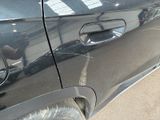 a close up of a car door handle on the side of the car