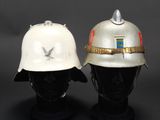 pair of british ww1 ww2 fireman ' s helmets