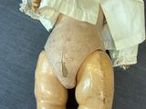 a doll that is sitting on a table