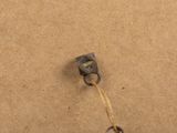 a close up of a kite with a string attached to it