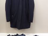 a picture of a jacket and pants hanging on a wall