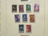 an image of a picture of a collection of stamps on a wall