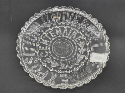 a glass plate with a circular design on it