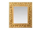 une image d'un miroir encadré d'or sur un mur blanc