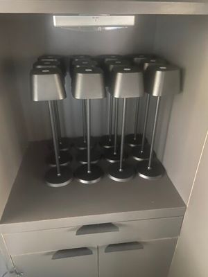 a small cabinet with a bunch of speakers on top of it