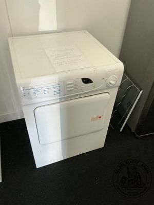 a white washer and dryer sitting next to each other