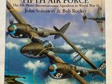 an image of a book with a picture of two planes flying in the sky
